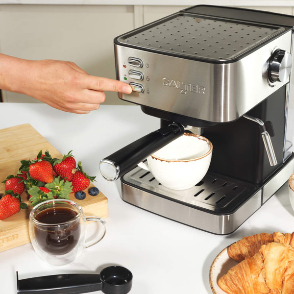 Black and silver espresso coffee machine with steam wand, shown at angle