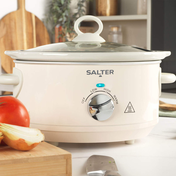 Cream Salter slow cooker with glass lid shown on kitchen counter