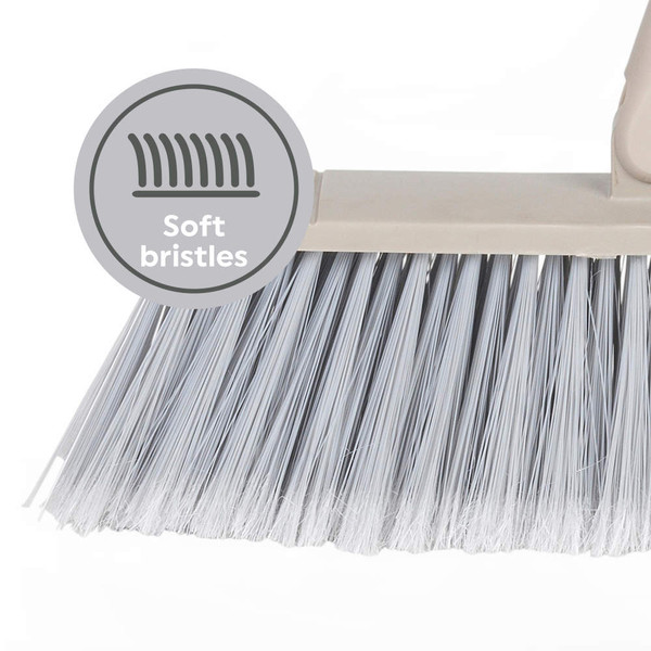 Grey broom head with soft bristles, shown close-up for product feature highlight