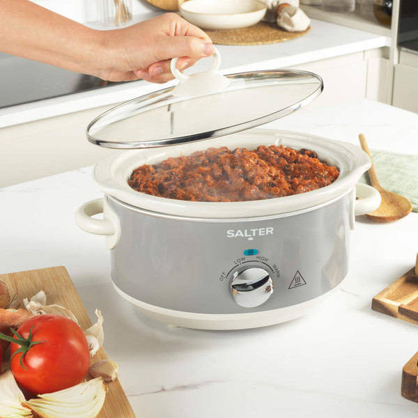 Grey Salter slow cooker with stew being served in modern kitchen setting