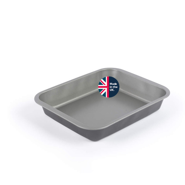 Grey non-stick rectangular roasting tin, viewed at an angle, sticker says made in the UK
