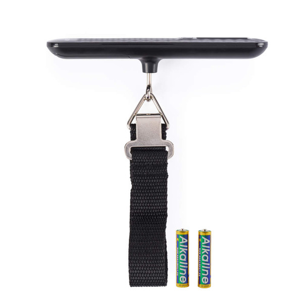 Black digital luggage scale with strap and two AA batteries, flat lay