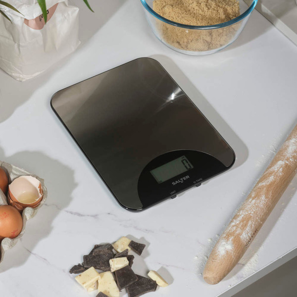 Boxed Salter stainless steel electronic kitchen scale with display, side angle