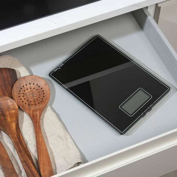 Salter digital kitchen scale showing a bowl of flour with an egg cracked on top