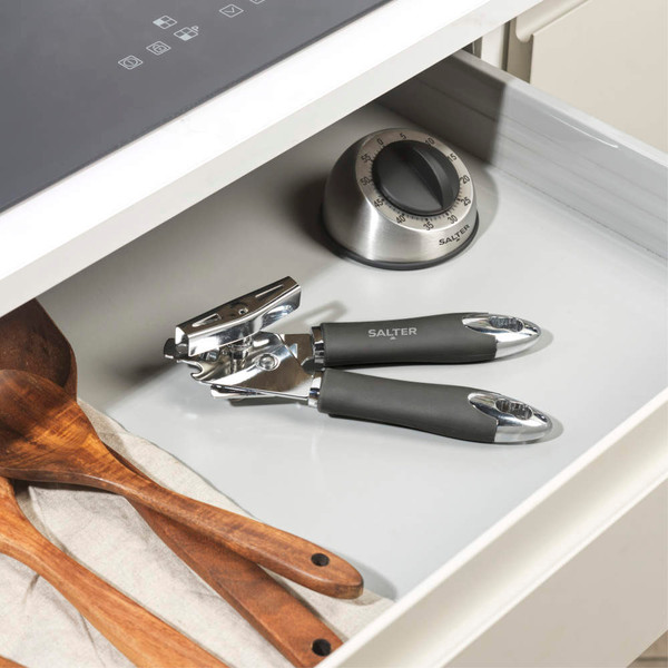 Salter manual can opener with black soft-grip handles, angled view