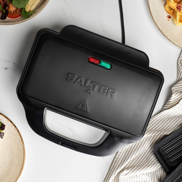 Black Salter sandwich and waffle maker closed on worktop, seen from above