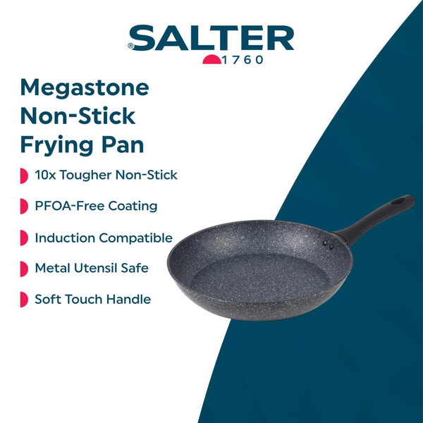 Set of black speckled non-stick saucepans and frying pans with glass lids on kitchen counter