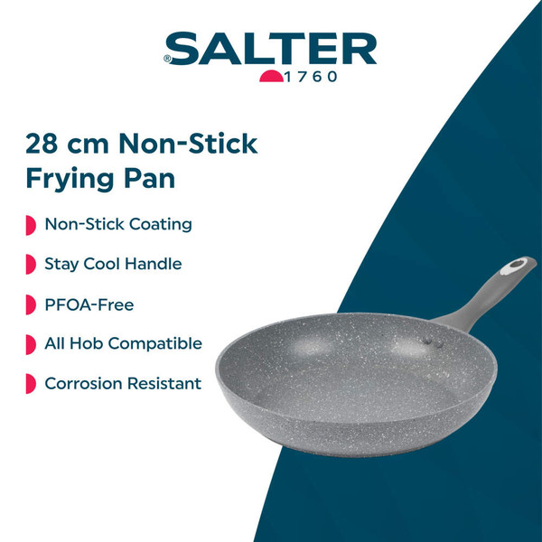 Set of grey non-stick pans and pots on kitchen counter and hob