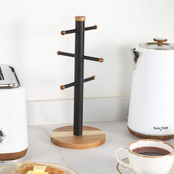 Wood and black metal kitchen roll holder on worktop