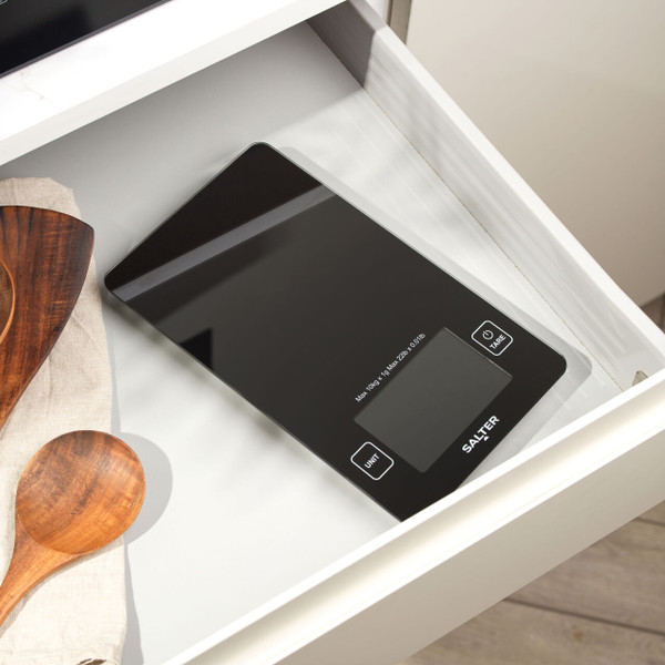 Black high capacity electronic scale in Salter branded retail packaging