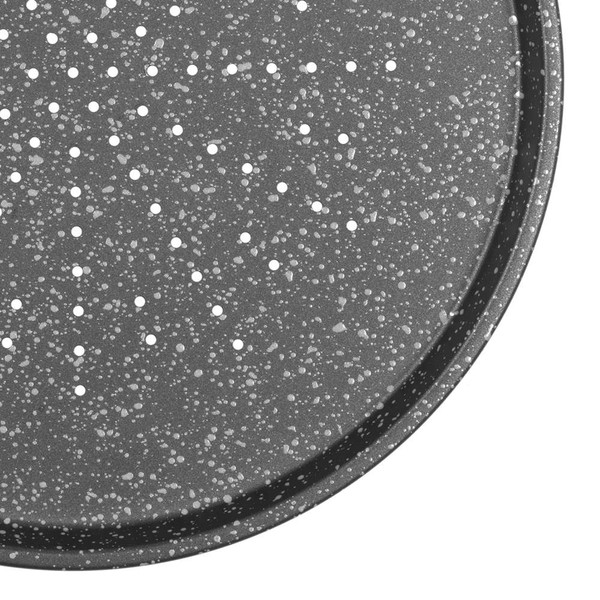 Round black baking tray with white speckles and perforated base
