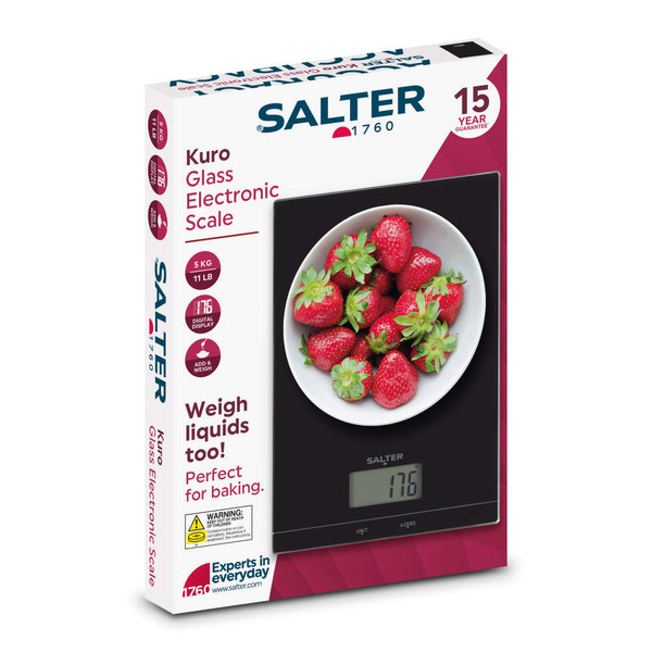 Kuro glass electronic kitchen scale in box, showing digital display and bowl of strawberries.
