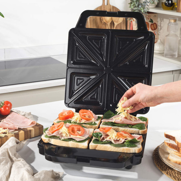 Salter 4-slice sandwich maker retail packaging showing product and key features