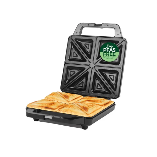 Black sandwich maker with four toasted sandwiches, PFAS free label visible
