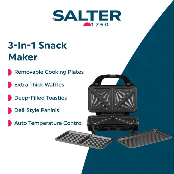 Black sandwich toaster with two toasted sandwiches on kitchen counter
