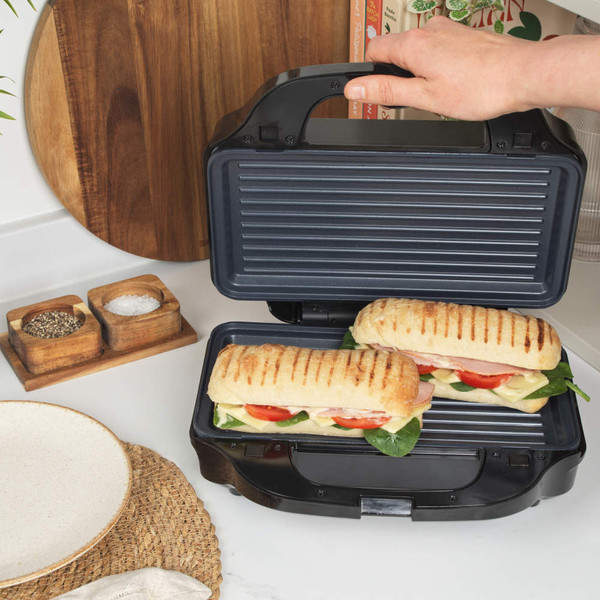 Salter stainless steel sandwich maker with black casing, closed, shown from above
