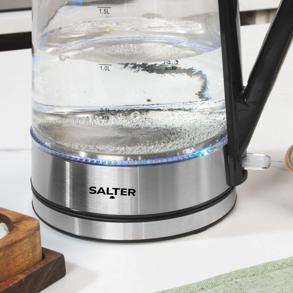 Glass electric kettle showing water boiling, stainless steel base, Salter branding visible