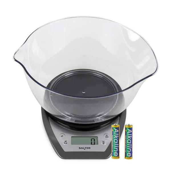 Digital kitchen scale with large clear mixing bowl and two AA batteries shown