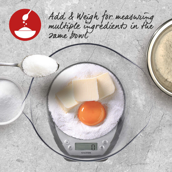 Kitchen scale weighing flour, butter and an egg in one bowl, showing add & weigh feature
