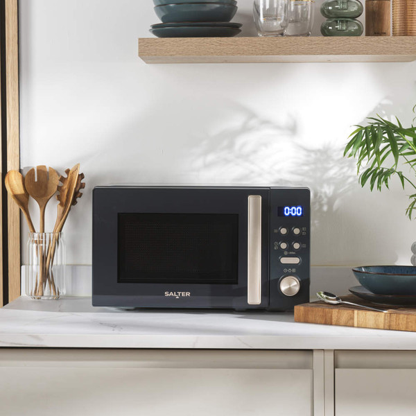 Salter blue-grey microwave oven, front view showing digital controls and handle