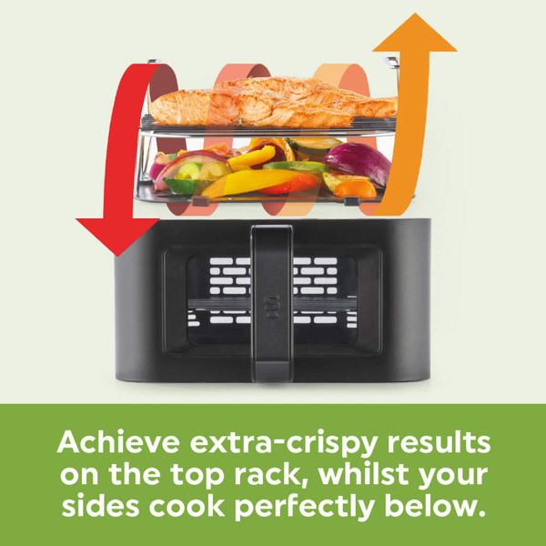 Black air fryer with salmon and vegetables showing separate racks for crisping and sides