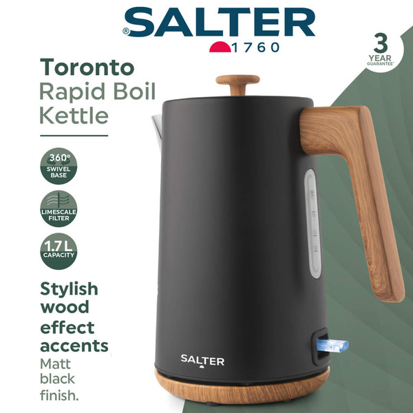 Black electric kettle with wood-effect handle on kitchen worktop