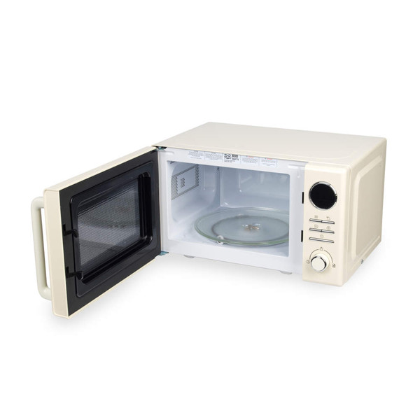 Cream microwave oven with door open, showing interior and glass turntable.