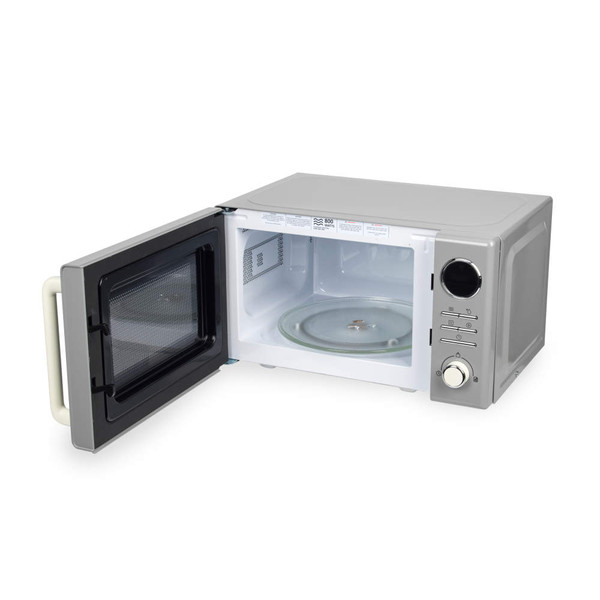Grey microwave oven with open door showing turntable and control panel