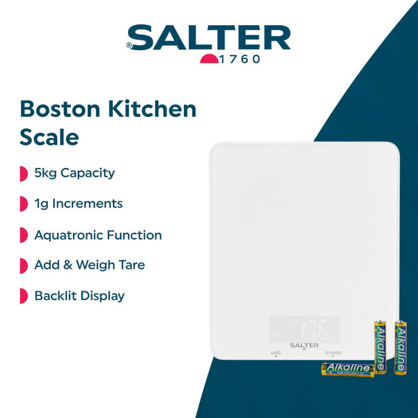 White digital kitchen scale with a bowl of fresh strawberries on display