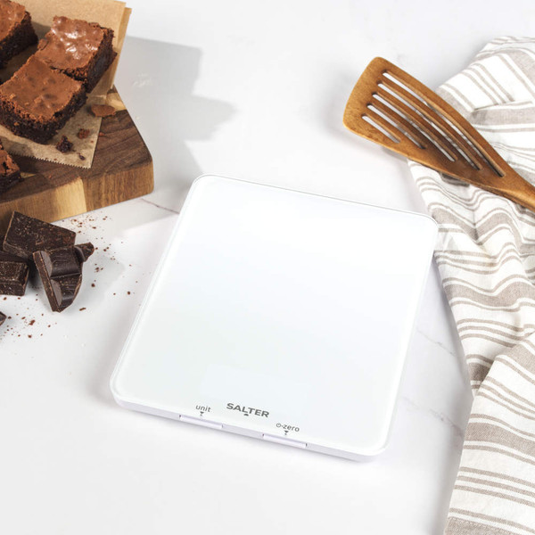 White digital kitchen scale with LCD display, showing 176 grams