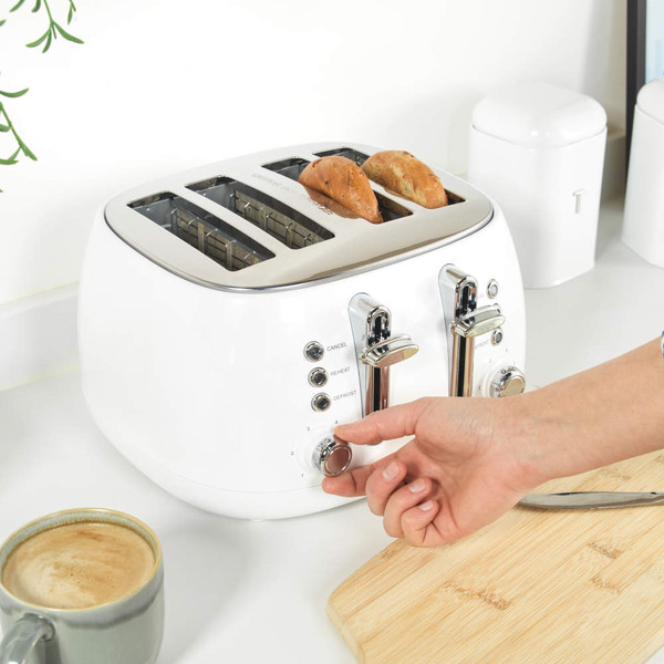 Top view of white 4-slice toaster, chrome finish, showing slots and controls