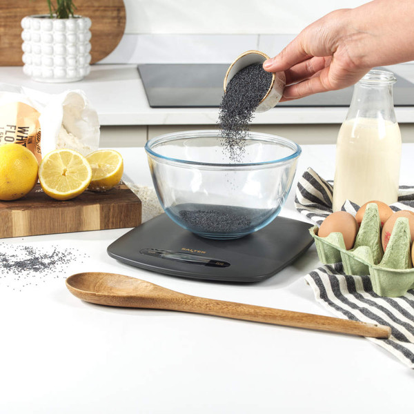 Charcoal digital kitchen scale with LCD display, shown at an angle on white background