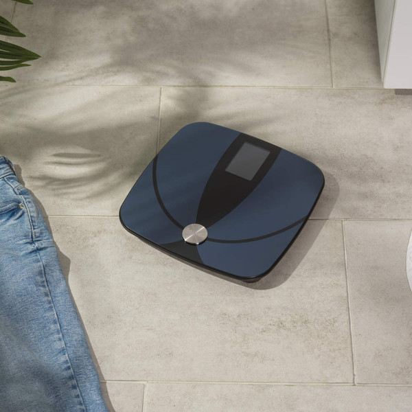 Black digital bathroom scale, square design, top view, Salter button visible.