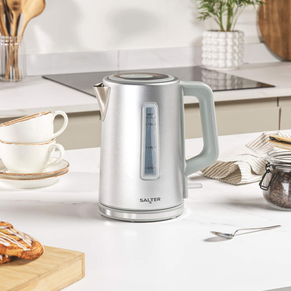 Silver electric kettle with water gauge, shown on kitchen counter