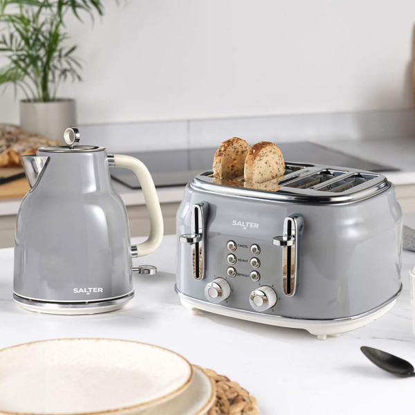 Grey Salter kettle and 4-slice toaster set on kitchen counter with toasted bread