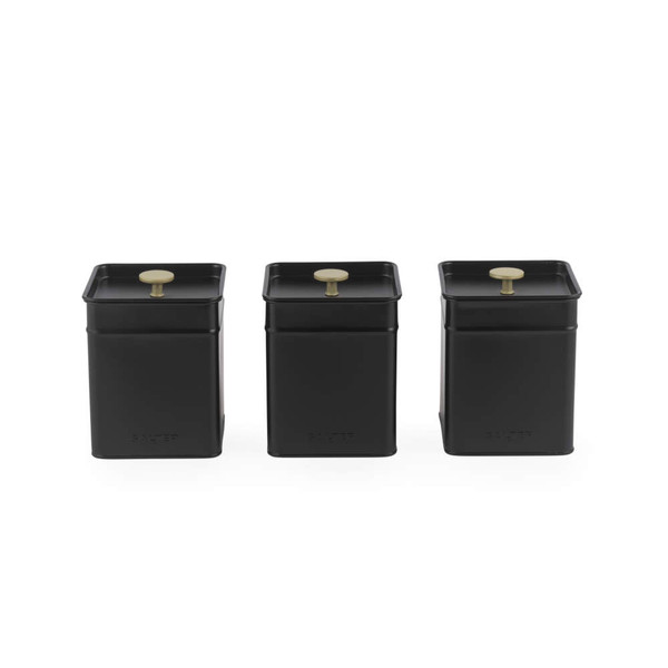 Set of three black metal storage canisters with gold knobs, front view.