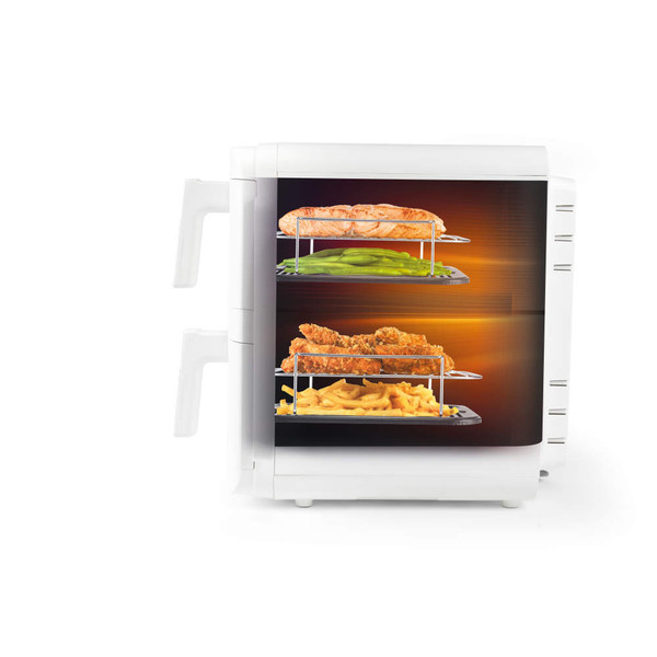 White air fryer with basket of cooked salmon and vegetables, showing airflow arrows.