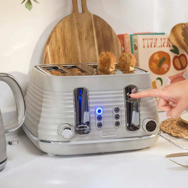 Taupe Salter kettle and 4-slice toaster set, ribbed design, shown with toasted bread.