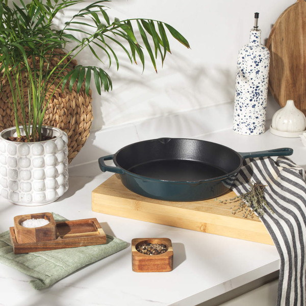 Green cast iron frying pan, Salter branding visible, shown base-up