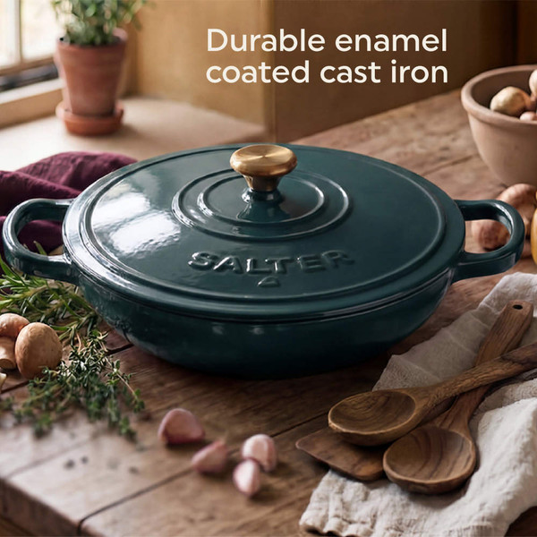 Green cast iron casserole dish shown from underneath with Salter branding and two handles.