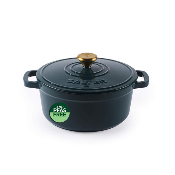 Green cast iron casserole dish with gold handle and PFAS free label