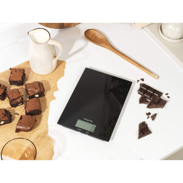Black digital kitchen scale with LCD display, shown from above.