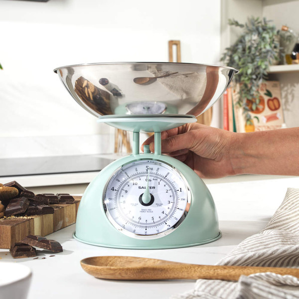 Salter mechanical kitchen scale packaging with retro-inspired mint green scale and bowl of cherries.