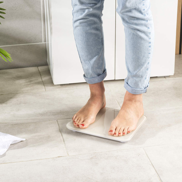 Cream Salter Halo electronic bathroom scale in retail box, front angled view