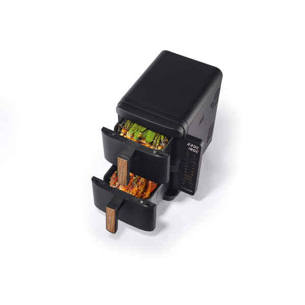 Black dual air fryer with two drawers, digital display, shown in use with cooked food