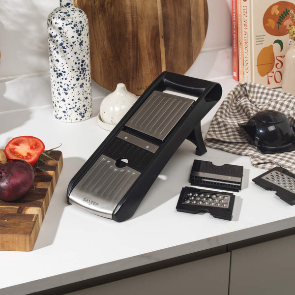 Black multi-blade vegetable mandoline slicer with attachments and food holder