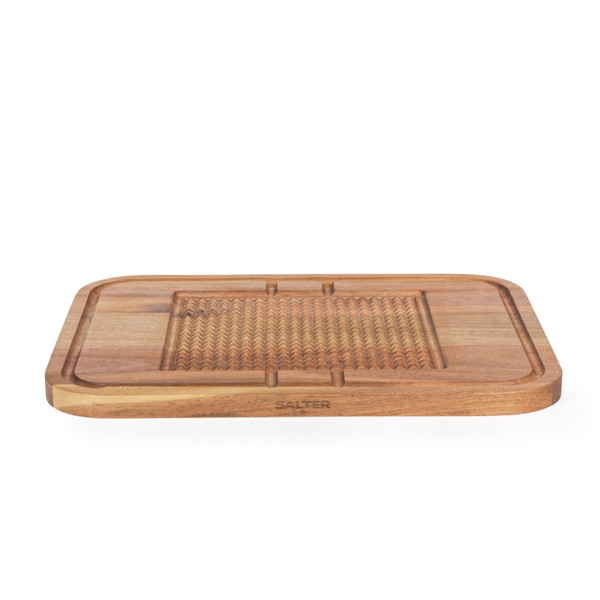 Large wooden carving board with crumb grooves and textured centre, shown from front angle.