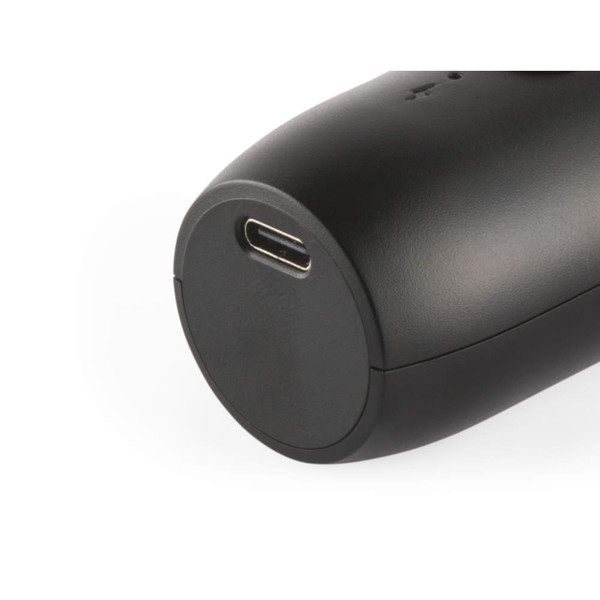 Close-up of black electronic device showing USB-C charging port