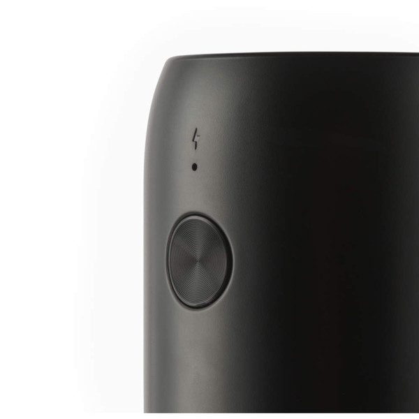 Black insulated travel mug showing side with button and charging symbol