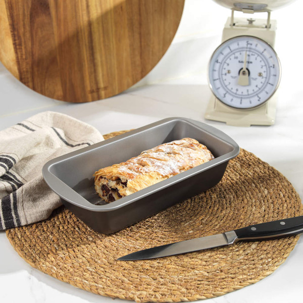 Grey non-stick loaf tin, top view, labelled 'Made in the UK'